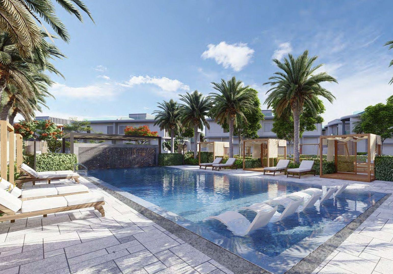 Three-bedroom townhouse facade with full-height glazing at Murjan Al Saadiyat, Saadiyat Island, Abu Dhabi